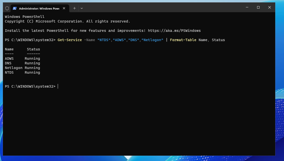 PowerShell output showing NTDS, ADWS, DNS, and Netlogon services running after domain controller promotion.